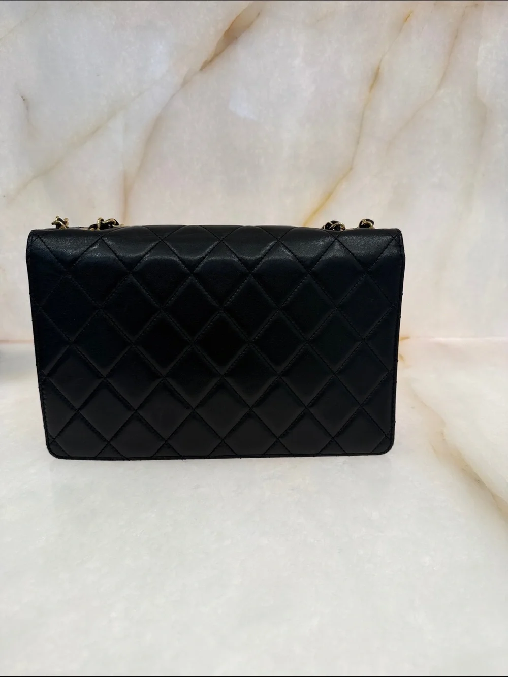 CHANEL Black Quilted Leather Shoulder Bag with Gold Hardware